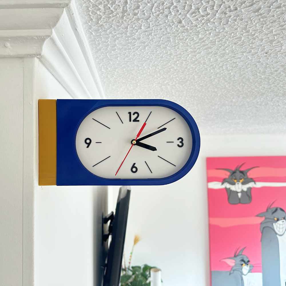 Reloj de Pared Decorativo NOOK – Ovalado Amarillo y Azul