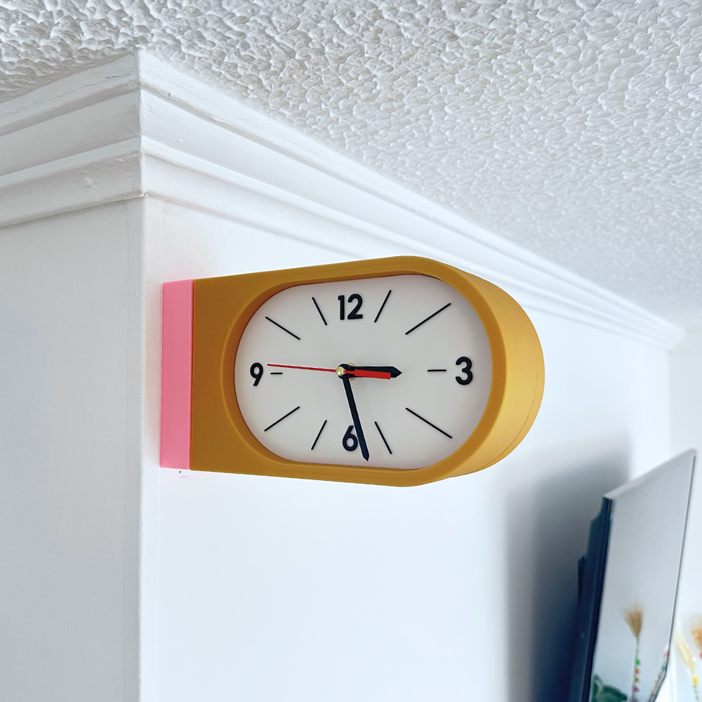 Reloj de Pared Decorativo NOOK – Ovalado Amarillo y Rosado