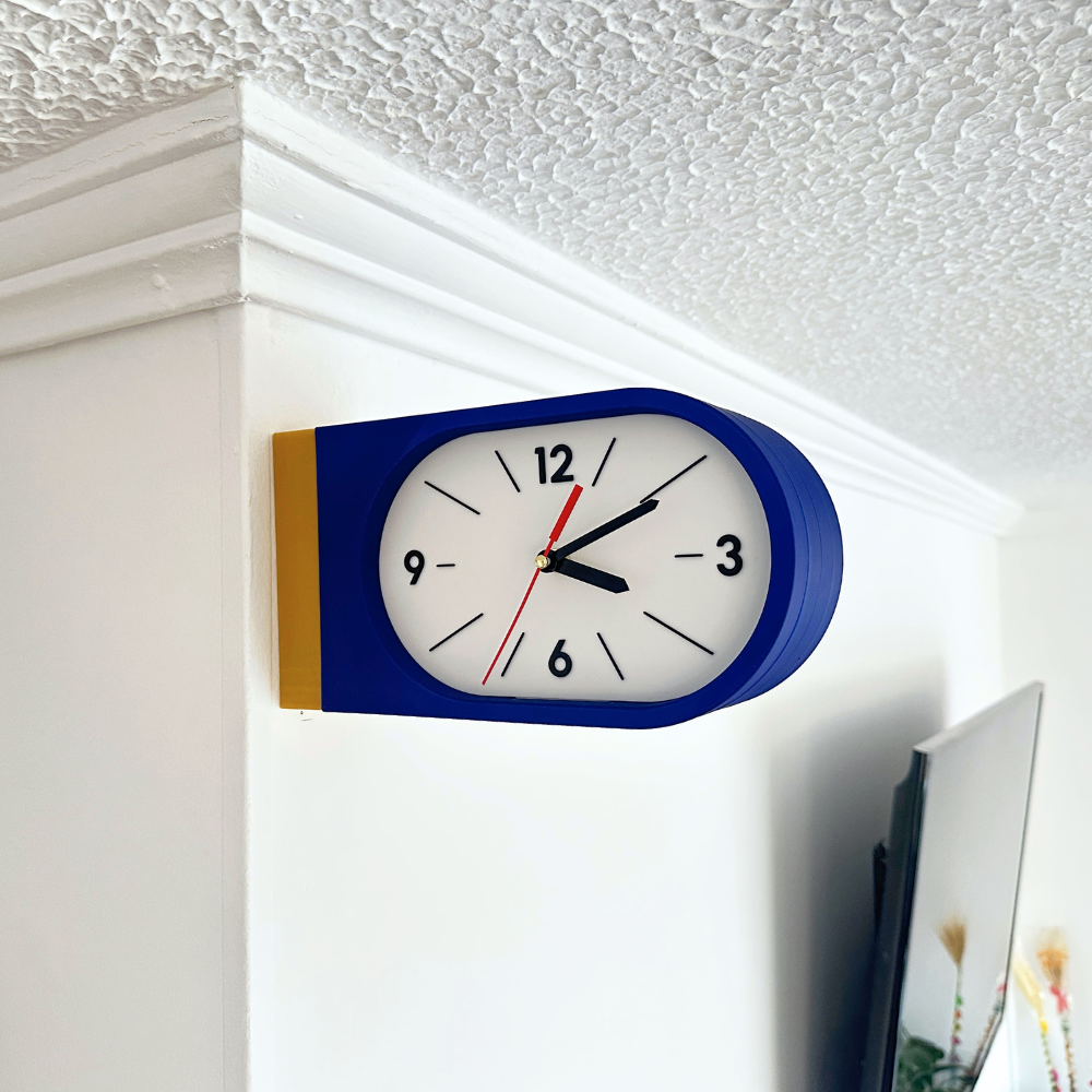 Reloj de Pared Decorativo NOOK – Ovalado Amarillo y Azul