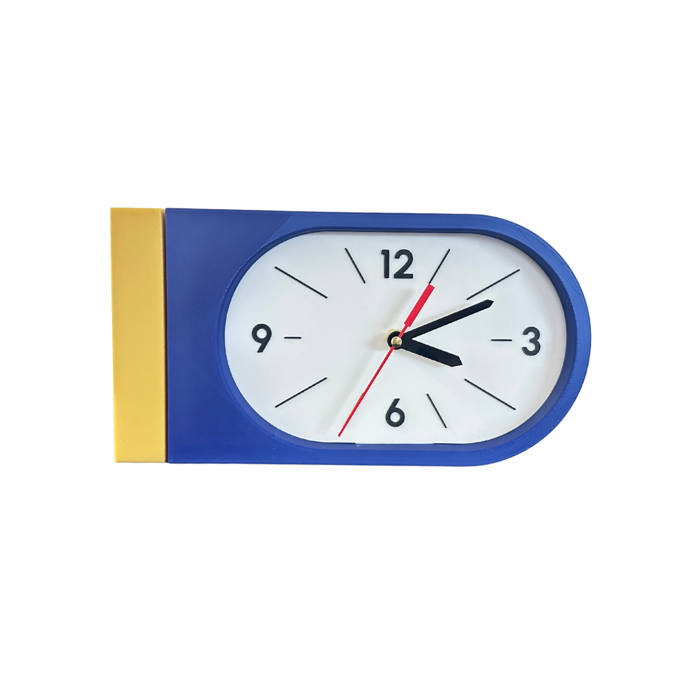 Reloj de Pared Decorativo NOOK – Ovalado Amarillo y Azul