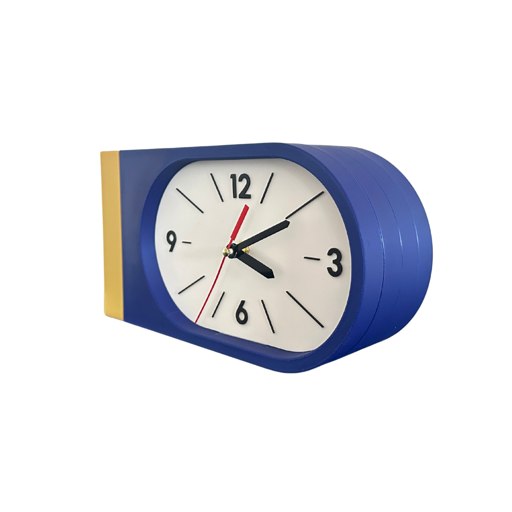 Reloj de Pared Decorativo NOOK – Ovalado Amarillo y Azul